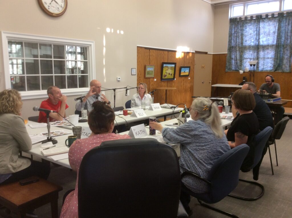 The High Plains Radio Readers Book Club, an all-volunteer effort, gathers for a book discussion broadcast at the High Plains Public Radio studio in Garden City, Kan. Photo courtesy of HPPR.