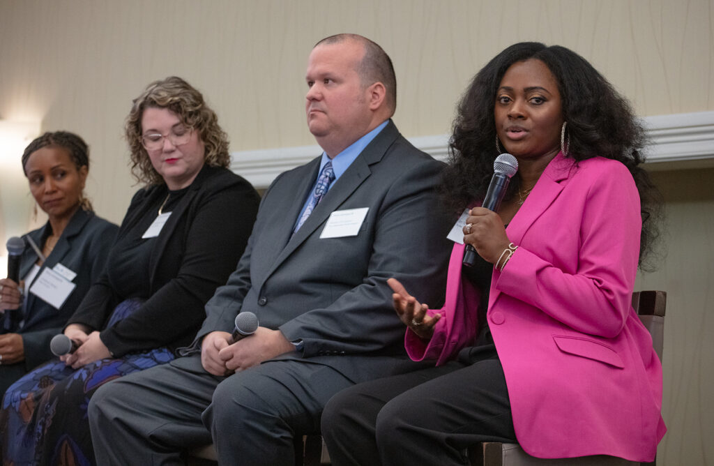 Janey Tate talks about her Miami-based publication Hy-Lo News at a Press Forward event. 