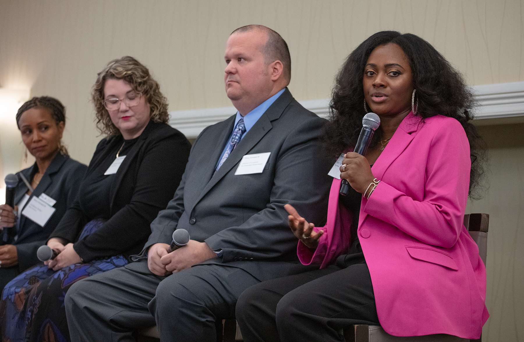Janey Tate talks about her Miami-based publication Hy-Lo News at a Press Forward event.