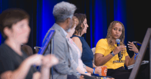 Press Forward's Graham Ringo speaks at the LION Sustainability Summit. Photo courtesy of LION Publishers.