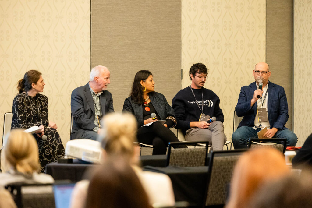 URL Media's S. Mitra Kalita, center, talks on a panel about Catalytic Capital.