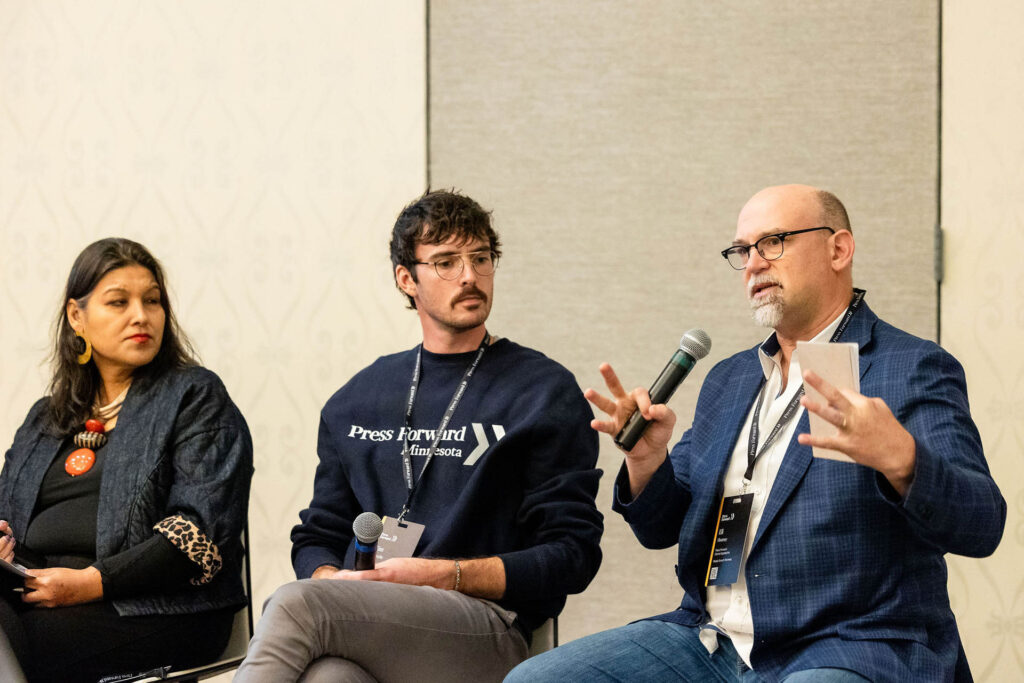 Eli Flournoy of Press Forward Appalachia talks about the Rural News Fund's use of catalytic capital at a Press Forward event.
