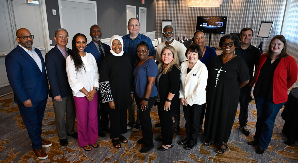 The “Reigniting Local News” program met in person in Kansas City. Back row, left to right: Martin Reynolds, Maynard Institute; Dickson Louie, Maynard Institute; Caesar Andrews, University of Nevada, Reno; Jason Cole, Excelsior Citizen; Talibdin El-Amin, St. Louis Argus; Dana James, Black Iowa News; Dustin Bartholomew, Fayetteville Flyer; Courtney Cole, Excelsior Citizen. Front row, left to right: Lisa Armstrong, University of California, Berkeley; Safiyyah El-Amin, St. Louis Argus; Mary Smith-Johnson, Black Iowa News; María José Ramírez Braiz, Te Lo Cuento News; Evelyn Hsu, Maynard Institute; Fran Scarlett, Scarlett Ink Media (Photo by Todd Feeback)